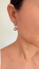 Pink Edison huggy earrings - round