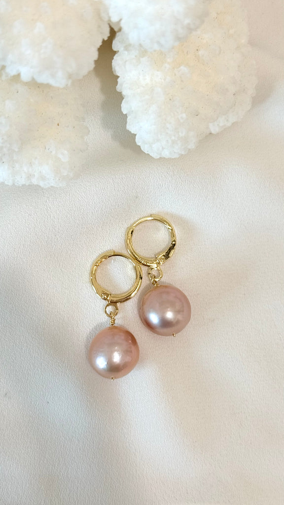 Pink Edison huggy earrings - round