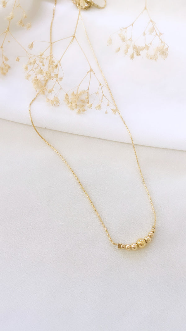 Graduated beaded bar necklace